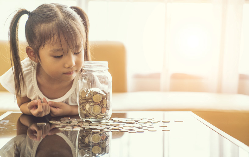 The NAFCU Journal - The Best Indirect Growth Strategy - Little girl with coin jar