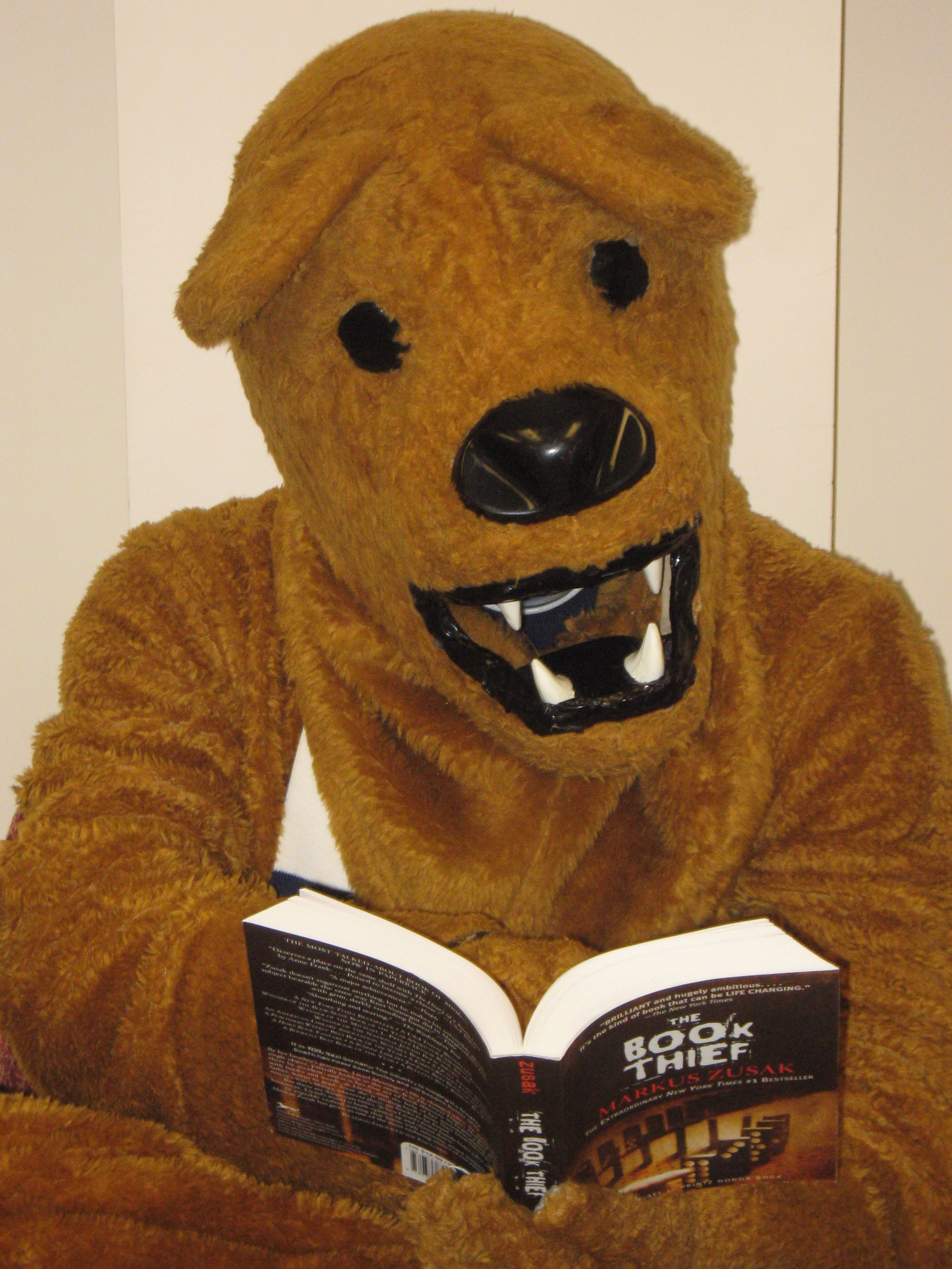 Image result for nittany lion reading a book